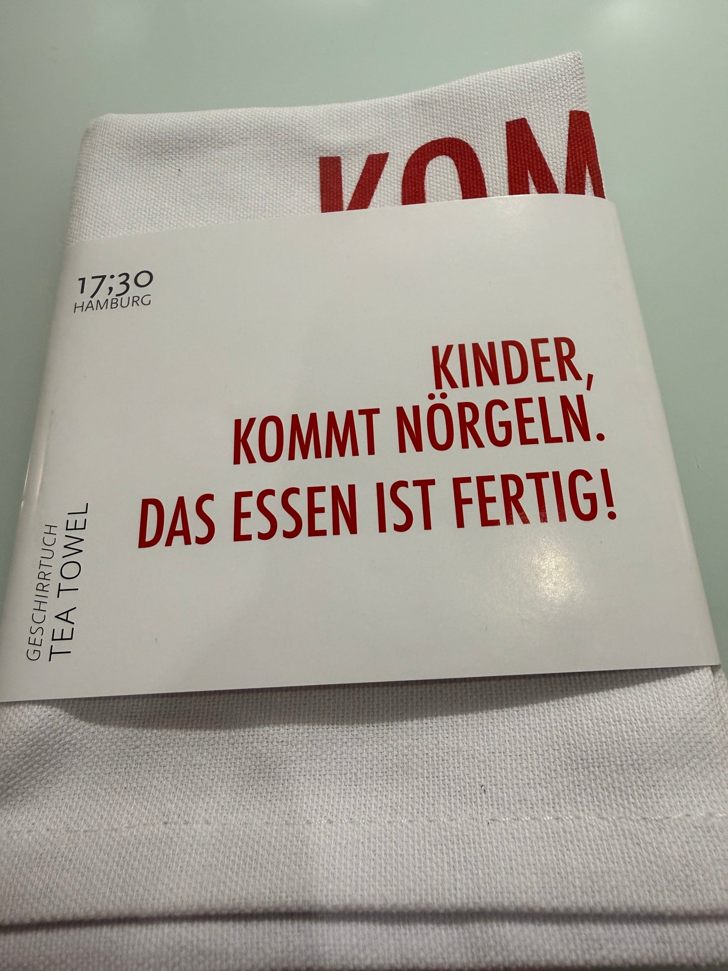 Verschiedene Geschirrtücher mit Motiv oder Text